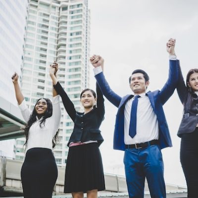 group-happy-young-business-people-with-hands-air-success-their-plans_1150-3059